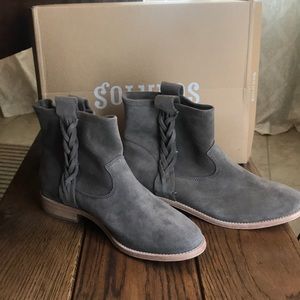 Suede Bootie with braided trim.
